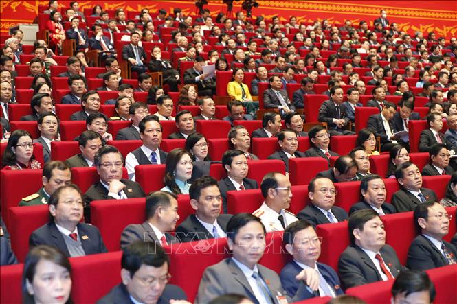 Trong ảnh: Đại biểu dự phiên thảo luận các văn kiện đại hội tại hội trường, sáng 28/1. Ảnh: TTXVN

