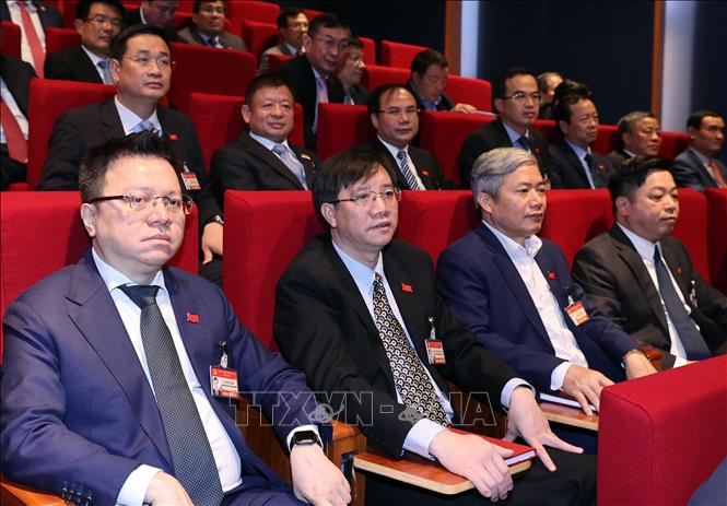 Trong ảnh: Đại biểu đoàn Đảng bộ Khối các cơ quan Trung ương dự phiên thảo luận các văn kiện đại hội tại hội trường, sáng 28/1. Ảnh: TTXVN
