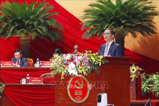 Trong ảnh: Đồng chí Trần Tuấn Anh, Ủy viên Trung ương Đảng, Bộ trưởng Bộ Công Thương trình bày tham luận. Ảnh: TTXVN