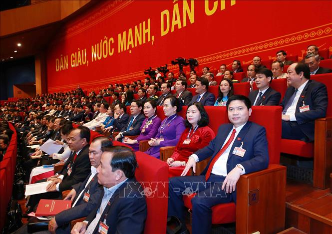 Trong ảnh: Đoàn đại biểu Đảng bộ tỉnh Hà Nam dự phiên thảo luận các văn kiện đại hội tại hội trường, sáng 28/1. Ảnh: TTXVN