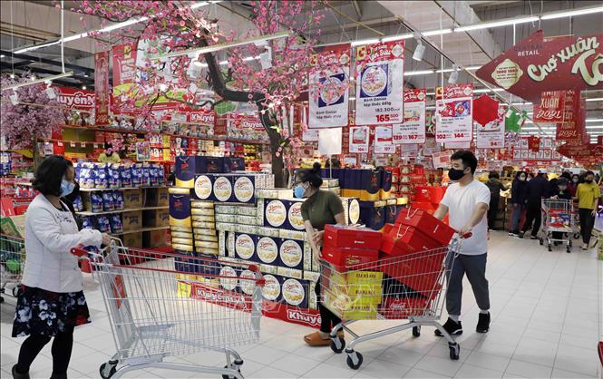 Trong ảnh: Người dân mua sắm tại siêu thị Big C Thăng Long, Hà Nội. Ảnh: Trần Việt - TTXVN