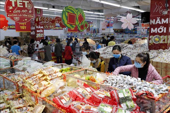 Trong ảnh: Khu bày bán các sản phẩm kẹo tại siêu thị Big C Thăng Long, Hà Nội. Ảnh: Trần Việt - TTXVN