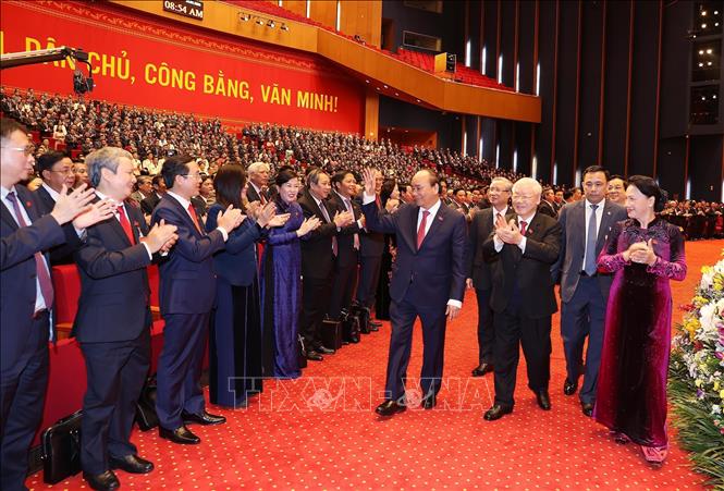 Đại hội XIII là một trong những Đại hội thành công nhất trên các mặt, truyền được cảm hứng và quyết tâm, ý chí, bản lĩnh để đưa đất nước phát triển ở tầm cao mới. Trong ảnh: Đại hội chào mừng Tổng Bí thư, Chủ tịch nước Nguyễn Phú Trọng cùng Thủ tướng Nguyễn Xuân Phúc, Chủ tịch Quốc hội Nguyễn Thị Kim Ngân đến dự phiên họp trù bị, sáng 25/1/2021. Ảnh: TTXVN