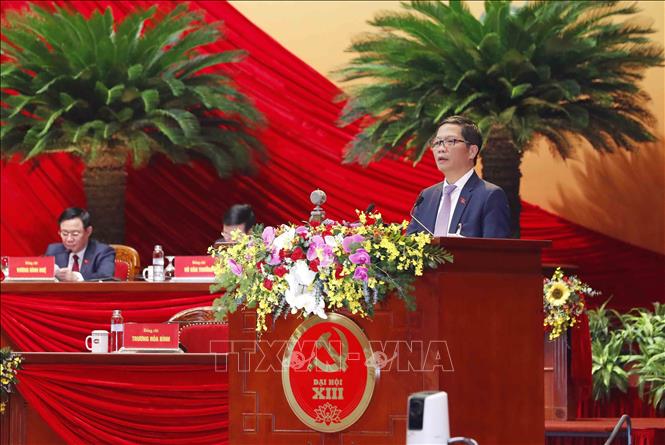 Các bài tham luận tại Đại hội đều nói lên tiếng nói của ngành, của lĩnh vực, của địa phương để làm rõ hơn những quan điểm đã được trình bày trong dự thảo văn kiện trình Đại hội XIII. Trong ảnh: Đồng chí Trần Tuấn Anh, Ủy viên Trung ương Đảng, Bộ trưởng Bộ Công Thương trình bày tham luận. Ảnh: TTXVN