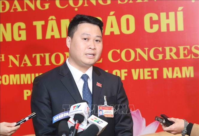 Đại biểu Hà Đức Minh, Bí thư Tỉnh Đoàn Lào Cai, sinh năm 1987, dân tộc Tày là đại biểu trẻ tuổi nhất dự Đại hội XIII của Đảng. Ảnh: TTXVN