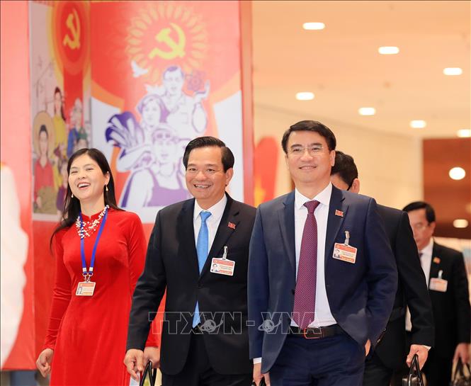 Các đại biểu đến dự phiên họp chiều 30/1/2021. Ảnh: TTXVN