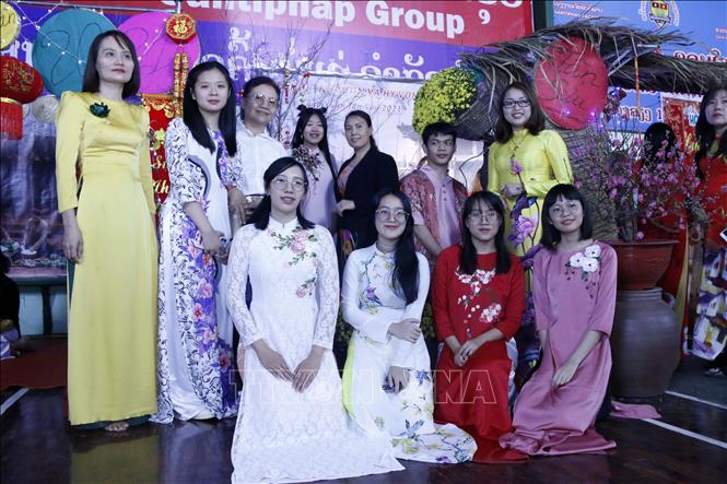 Trong ảnh: Lưu lại khoảng khắc tại chương trình. Ảnh: Phạm Kiên - Phóng viên TTXVN tại Lào