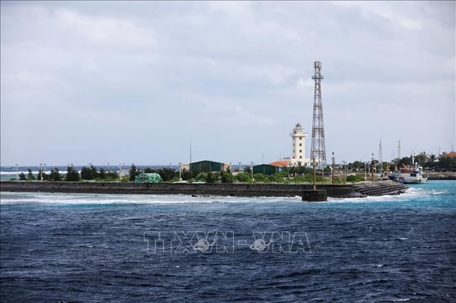 Photo: Sinh Ton island is covered in green. VNA Photo: Thành Đạt