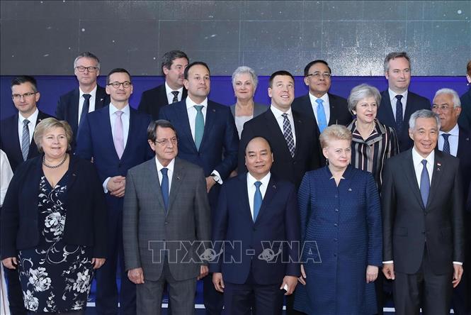 Thủ tướng Nguyễn Xuân Phúc và các trưởng đoàn chụp ảnh chung tại Phiên họp toàn thể thứ hai Hội nghị Cấp cao Á - Âu lần thứ 12 (ASEM 12), ngày 19/10/2018, tại Brussels (Bỉ). Ảnh: Thống Nhất – TTXVN