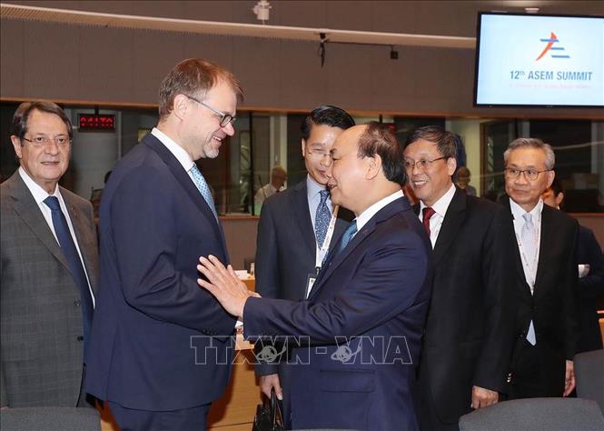 Thủ tướng Nguyễn Xuân Phúc gặp Thủ tướng Phần Lan Juha Petri Sipilä tại Phiên họp toàn thể thứ nhất Hội nghị Cấp cao Á-Âu lần thứ 12 (ASEM 12), ngày 19/10/2018, tại Brussles (Bỉ). Ảnh: Thống Nhất – TTXVN