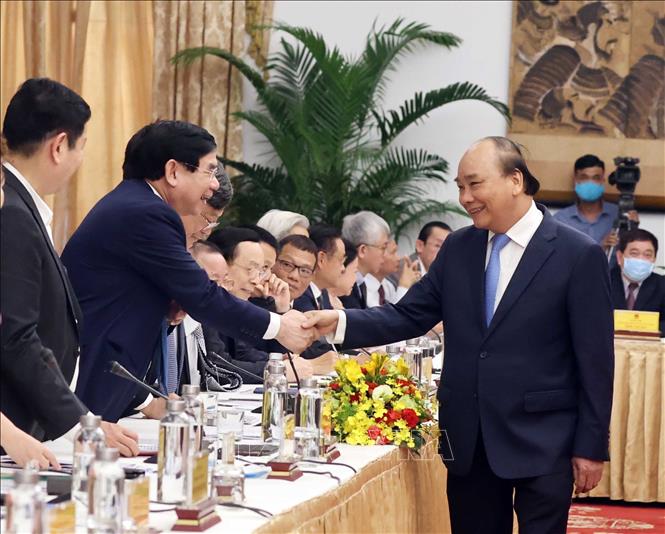 Trong ảnh: Thủ tướng Nguyễn Xuân Phúc với đại biểu dự cuộc “Đối thoại 2045”. Ảnh: Thống Nhất - TTXVN

