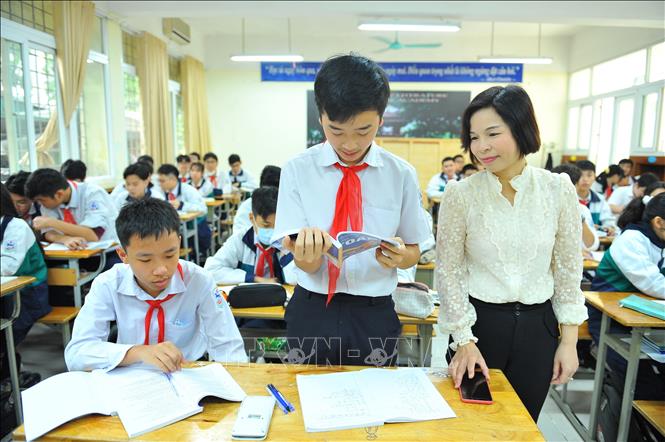 Võ Minh Quang hiện đang học lớp 9A3 tại trường THCS Giảng Võ. Ảnh: Minh Đức - TTXVN