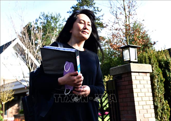 Trong ảnh: Giám đốc tài chính (CFO) tập đoàn Huawei Mạnh Vãn Châu tới tòa án Tối cao British Columbia ở Vancouver, British Colombia, Canada, ngày 22/3/2021. Ảnh: AFP/ TTXVN