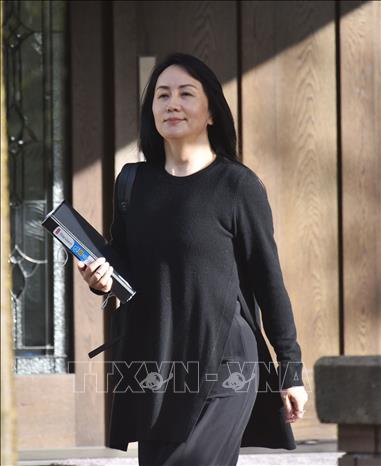 Trong ảnh: Giám đốc tài chính (CFO) tập đoàn Huawei Mạnh Vãn Châu tới tòa án Tối cao British Columbia ở Vancouver, British Colombia, Canada, ngày 22/3/2021. Ảnh: AFP/ TTXVN