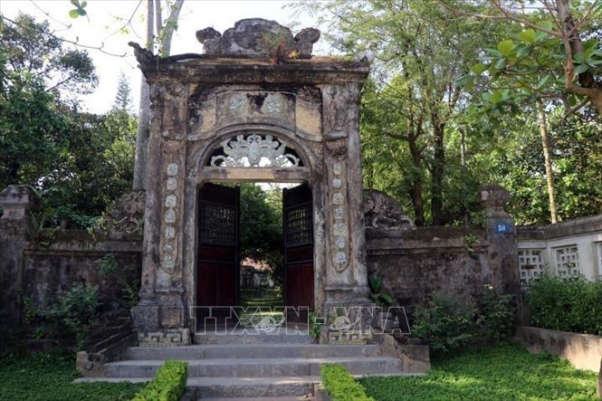 Photo: An Hien ancient house entrance. VNA Photo: Đỗ Trưởng