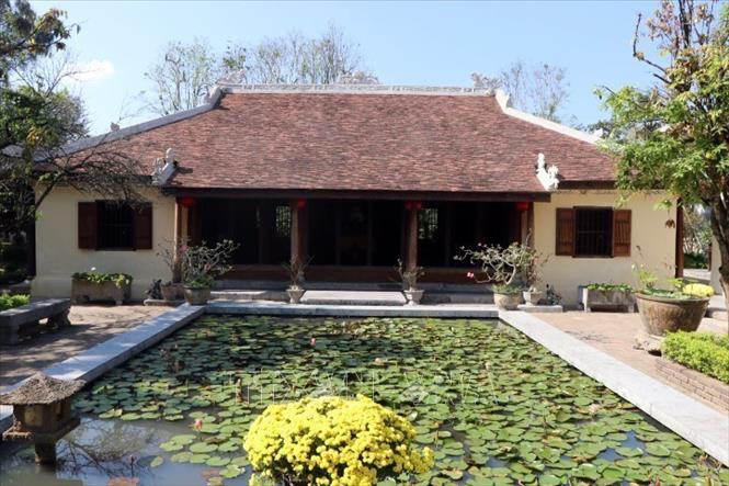 Photo: Architecture and nature harmoniously blending together has brought An Hien Garden House to become the appealing attraction in Hue. VNA Photo: Đỗ Trưởng