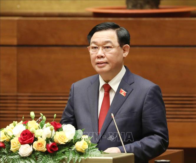 Photo: Newly-elected NA Chairman Vuong Dinh Hue gives an oath speech. VNA Photo
