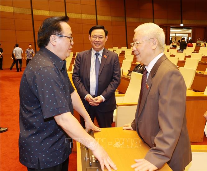 Trong ảnh: Tổng Bí thư, Chủ tịch nước Nguyễn Phú Trọng với các đại biểu dự kỳ họp. Ảnh: Trí Dũng - TTXVN