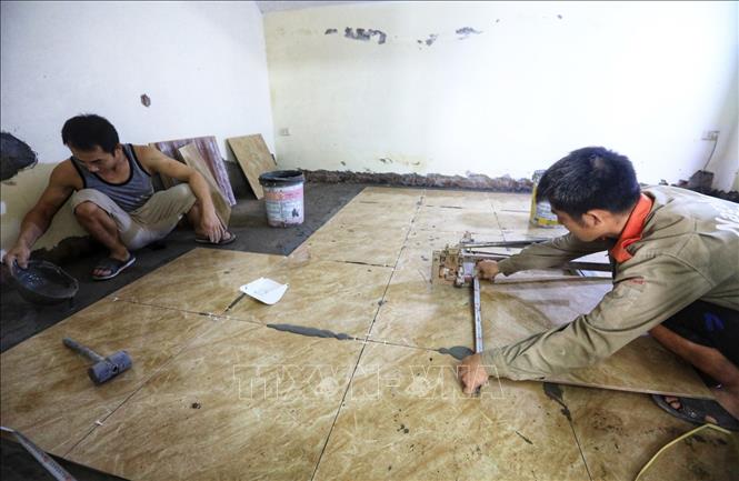 Trong ảnh: Các cơ sở vật chất nhà hành chính của Trung tâm VHTT và TT huyện Thanh Trì đang được gấp rút hoàn thành. Ảnh: Thành Đạt - TTXVN