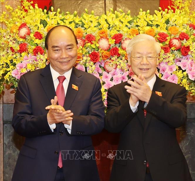 Photo: President Nguyen Xuan Phuc and Party General Secretary Nguyen Phu Trong at the ceremony. VNA Photo: Trí Dũng