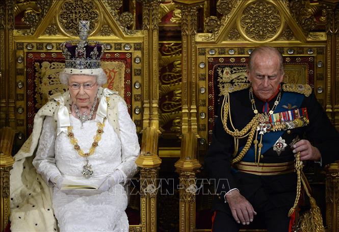 Trong ảnh (tư liệu): Nữ hoàng Anh Elizabeth II (trái) và Hoàng tế Philip tại một sự kiện ở London ngày 4/6/2014. Ảnh: AFP/ TTXVN