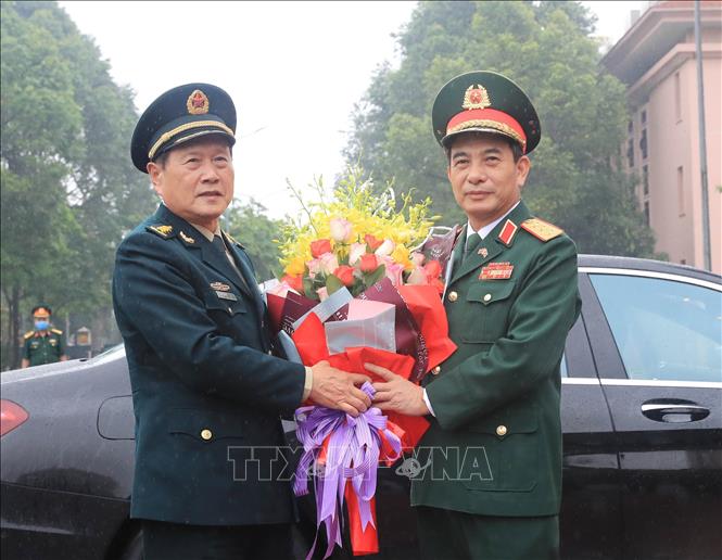 Trong ảnh: Bộ trưởng Quốc phòng Phan Văn Giang đón Bộ trưởng Quốc phòng Trung Quốc Ngụy Phượng Hòa. Ảnh: Trọng Đức - TTXVN