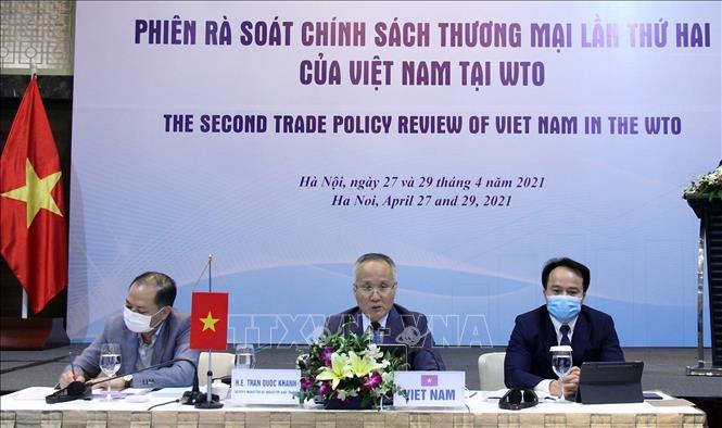 Photo: Deputy Minister of Industry and Trade Tran Quoc Khanh (centre) chairs the review session. VNA Photo: Trần Việt
