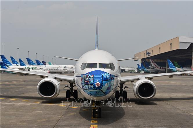 Trong ảnh: Máy bay của hãng hàng không Garuda tại sân bay ở Tangerang, Indonesia. Ảnh: AFP/ TTXVN