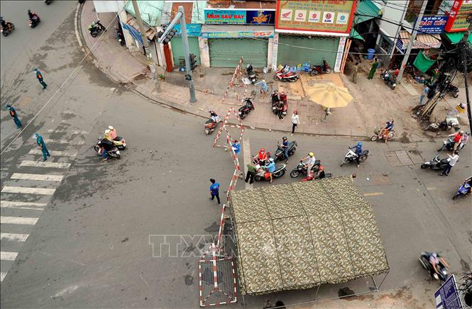Trong ảnh: Điểm kiểm soát y tế nằm trên đường Lê Quang Định, phường 1, quận Gò Vấp. Ảnh: An HIếu - TTXVN