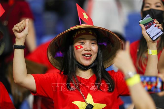 Photo: Vietnamese fans during the match.  VNA Photo: Hoàng Linh