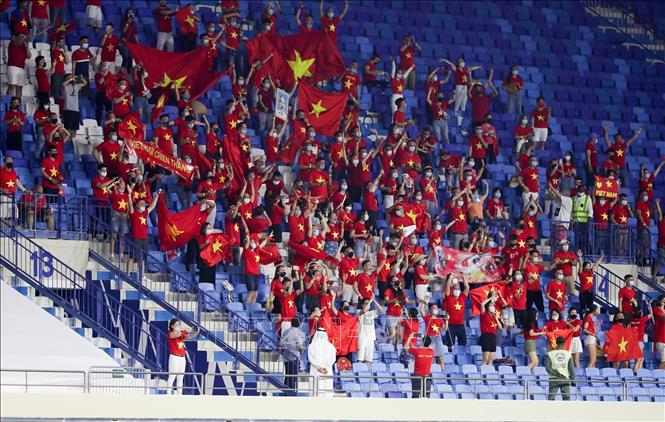 Photo: Vietnamese fans during the match.  VNA Photo: Hoàng Linh