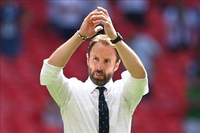 Trong ảnh: Huấn luyện viên Gareth Southgate vui mừng sau khi các học trò giành chiến thắng trong trận đấu với Croatia trên sân vận động Wembley ở London, Anh, ngày 13/6/2021. Ảnh: AFP/TTXVN