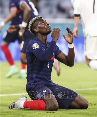 Trong ảnh: Tiền vệ tuyển Pháp Paul Pogba sau khi bỏ lỡ cơ hội ghi bàn vào lưới tuyển Đức tại vòng chung kết EURO 2020 ở Munich, ngày 15/6/2021. Ảnh: THX/TTXVN
