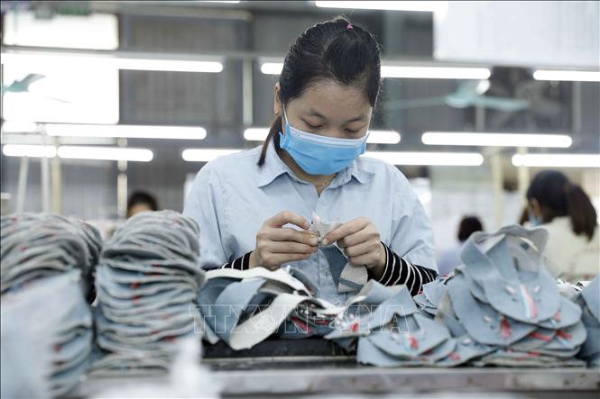 Photo: A footwear production line at the Ha Tay Chemical Weave Co. Ltd. VNA Photo: Trần Việt