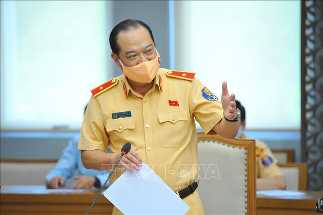 Thiếu tướng Lê Xuân Đức, Phó Cục trưởng Cục CSGT phát biểu tại cuộc họp. Ảnh: Minh Đức – TTXVN