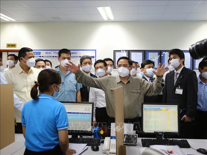 Trong ảnh: Thủ tướng Phạm Minh Chính kiểm tra tại Công ty Nissei Electric Việt Nam (Khu chế xuất Linh Trung). Ảnh: Thành Chung - TTXVN