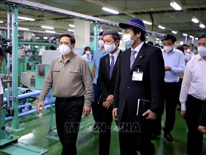 Trong ảnh: Thủ tướng Phạm Minh Chính làm việc tại Công ty Nissei Electric Việt Nam (Khu chế xuất Linh Trung). Ảnh: Thành Chung - TTXVN