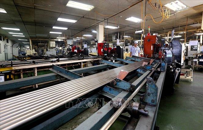 Sản xuất các linh kiện cơ khí tại Công ty TNHH MTEX Việt Nam, tổng vốn đầu tư hơn 5 triệu USD của Nhật Bản tại Khu chế xuất Tân Thuận (TP Hồ Chí Minh). Ảnh: Danh Lam – TTXVN