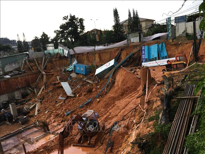 Photo: Heavy rains cause a land slide at a construction site in Da Lat city, the Central Highlands province of Lam Dong. VNA Photo