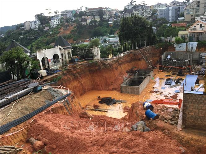 Photo: Heavy rains cause a land slide at a construction site in Da Lat city, the Central Highlands province of Lam Dong. VNA Photo