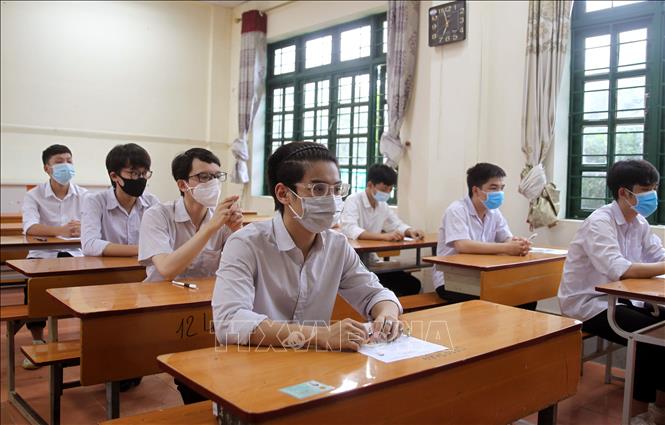Trong ảnh: Các thí sinh chuẩn bị làm bài tại điểm thi số 4, thành phố Lào Cai. Ảnh: Quốc Khánh - TTXVN