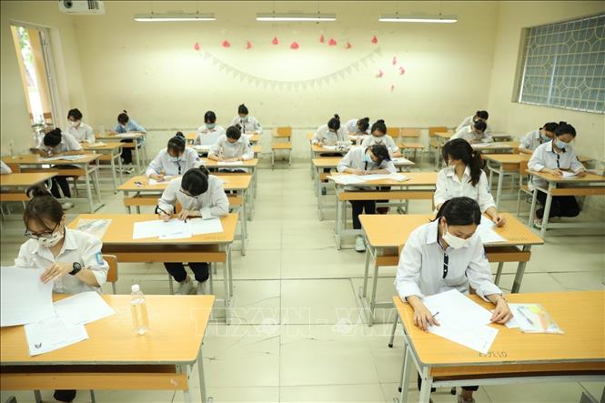 Photo: Students take exams at the Nguyen Gia Thieu Highschool in Long Bien District, Hanoi. VNA Photo