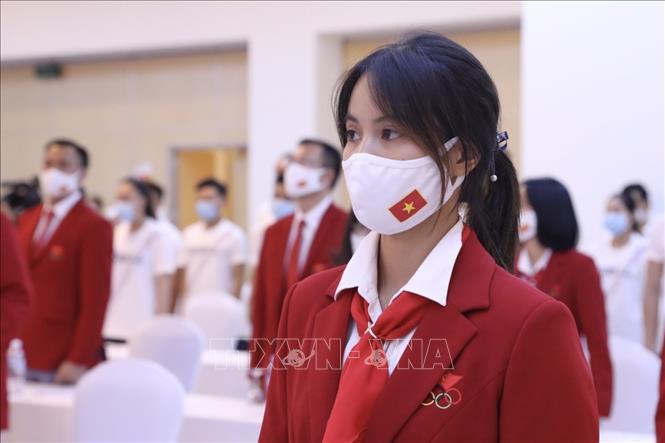 Trong ảnh: Thành viên Đoàn Thể thao Việt Nam dự Olympic Tokyo 2020 tại lễ xuất quân. Ảnh: Minh Quyết - TTXVN