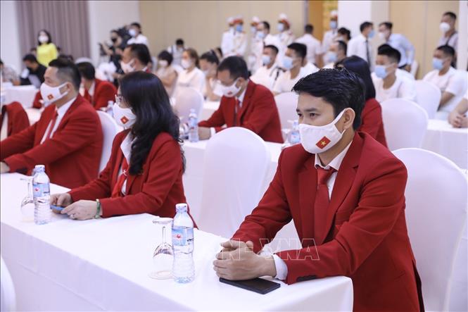 Trong ảnh: Thành viên Đoàn Thể thao Việt Nam dự Olympic Tokyo 2020 tại lễ xuất quân. Ảnh: Minh Quyết - TTXVN