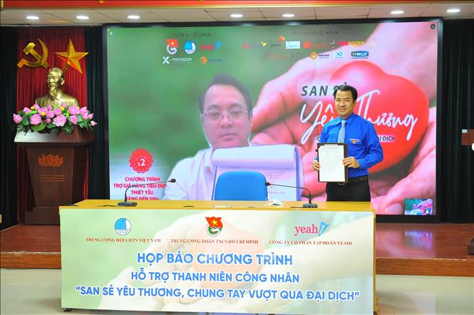 Trong ảnh: Đại diện Trung ương Đoàn Thanh niên Cộng sản Hồ Chí Minh và các doanh nghiệp, đơn vị ký kết trực tuyến triển khai chương trình. Ảnh: Minh Đức - TTXVN

