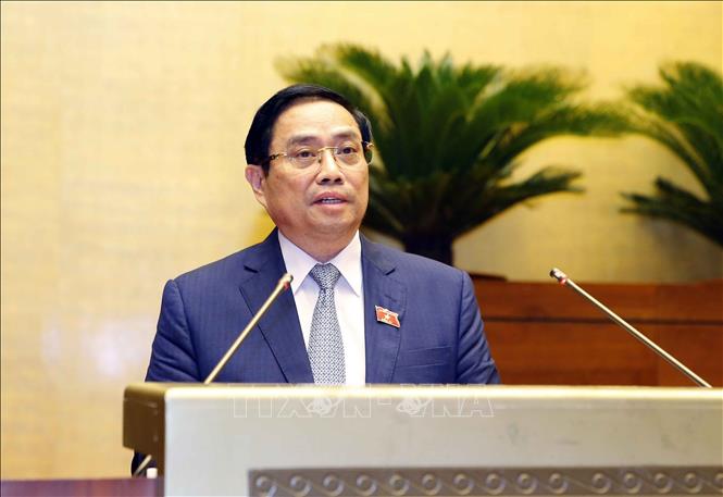 Thủ tướng Phạm Minh Chính trình Quốc hội về cơ cấu tổ chức của Chính phủ nhiệm kỳ 2021-2026. Ảnh: Doãn Tấn - TTXVN