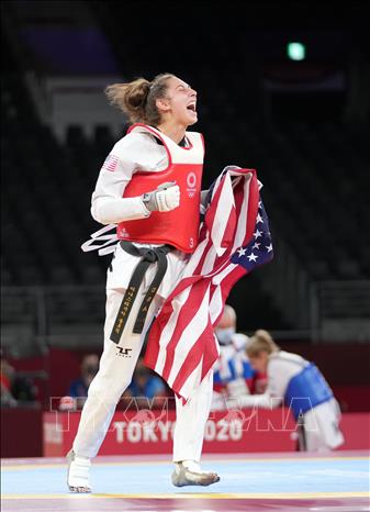 Trong ảnh: Nữ vận động viên Anastasija Zolotic của Mỹ vui mừng sau giành chiến thắng trong trận chung kết Taekwondo tại Olympic Tokyo 2020 ngày 25/7/2021. Ảnh: THX/TTXVN