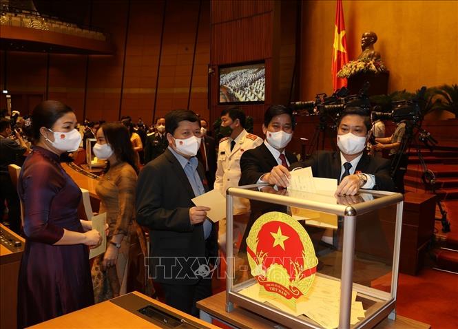 Photo: NA deputies cast their ballots to elect the State President for the 2021–2026 tenure. VNA Photo