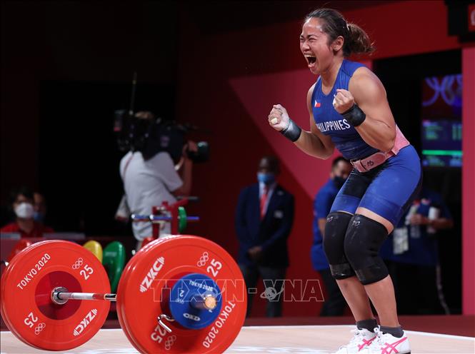Trong ảnh: Nữ đô cử Hidilyn Diaz của Philippines thi đấu ở nội dung cử tạ hạng cân 55kg tại Olympic Tokyo 2020, Nhật Bản ngày 26/7/2021. Ảnh: THX/TTXVN 