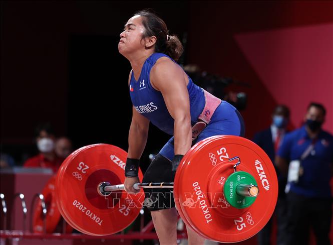 Trong ảnh: Nữ đô cử Hidilyn Diaz của Philippines thi đấu ở nội dung cử tạ hạng cân 55kg tại Olympic Tokyo 2020, Nhật Bản ngày 26/7/2021. Ảnh: THX/TTXVN 